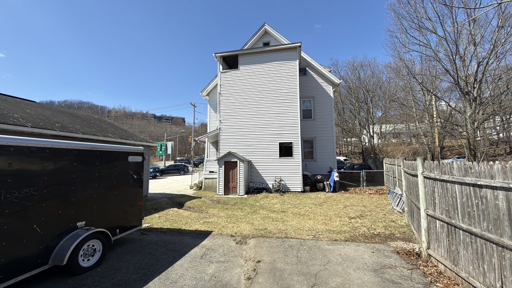 328 Brooks Street Worcester, MA 01606 - Photo 6 of 32 a view of a house with a patio