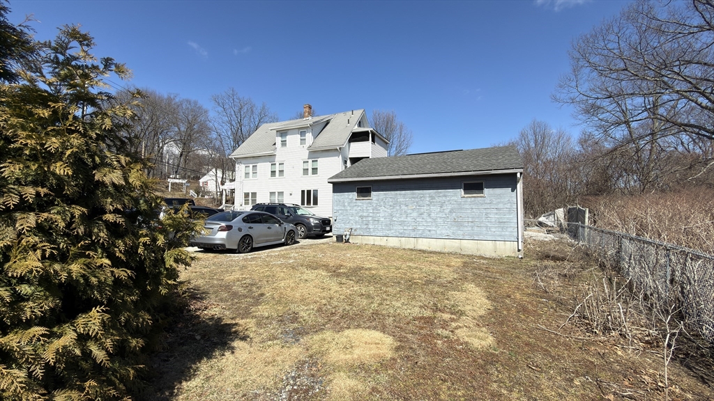 328 Brooks Street Worcester, MA 01606 - Photo 7 of 32 a view of a house with a snow