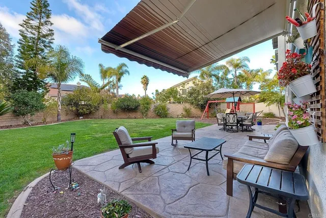 a kitchen with a table and chairs in it
