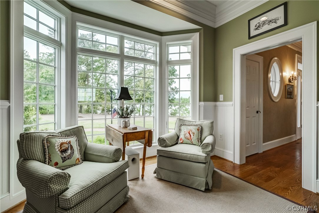 1571 Pine Hall Road Mathews, VA 23109 - Photo 19 of 48 a living room with furniture and a window