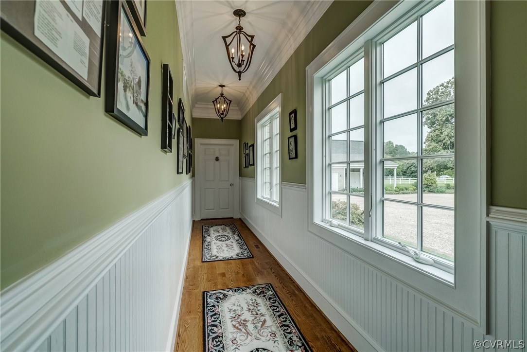 1571 Pine Hall Road Mathews, VA 23109 - Photo 23 of 48 a view of an entryway with a floor to ceiling window