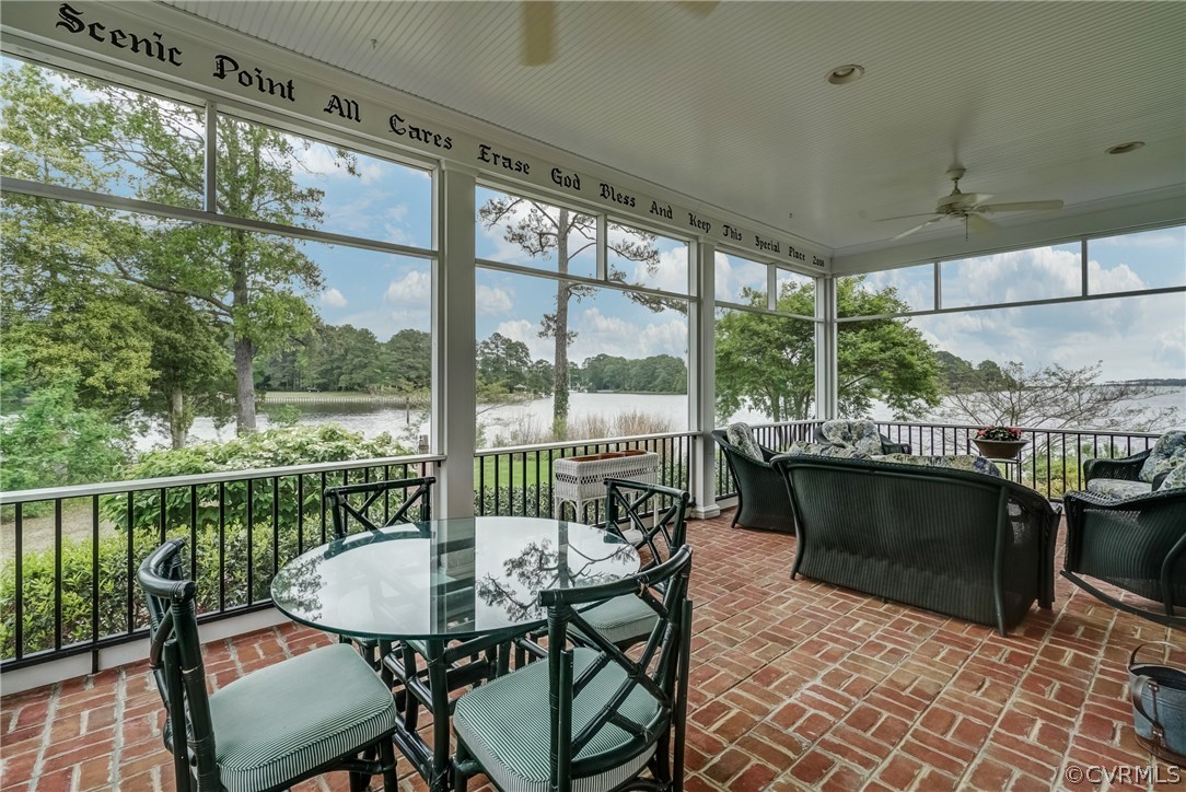 1571 Pine Hall Road Mathews, VA 23109 - Photo 25 of 48 a view of a chair and table in the balcony