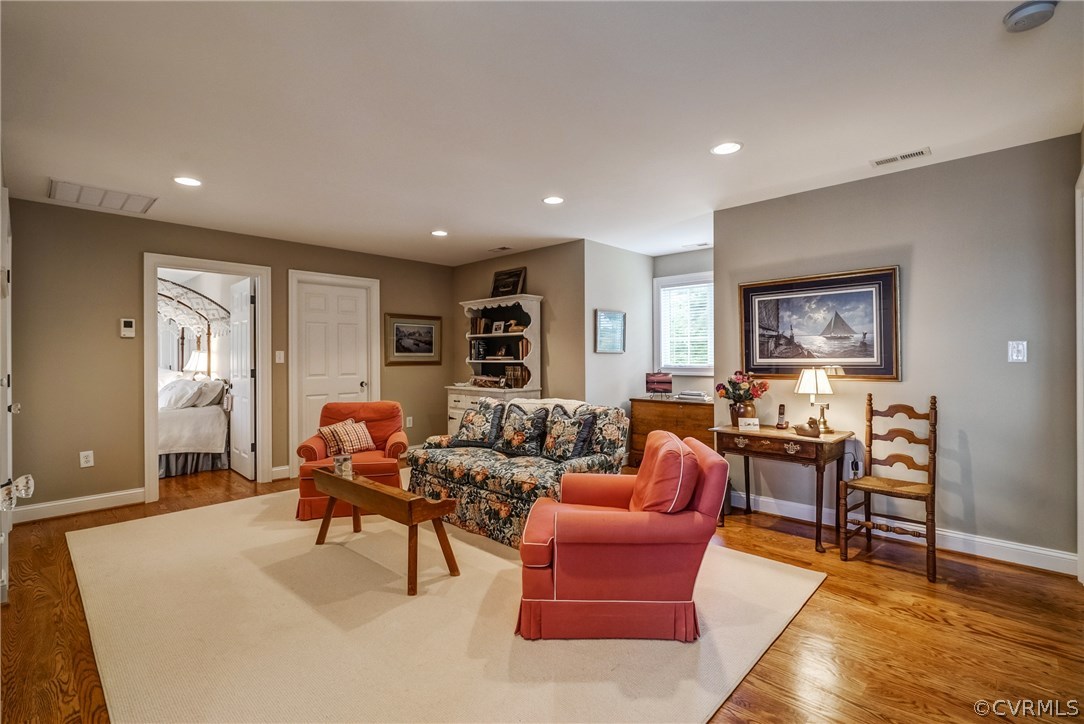 1571 Pine Hall Road Mathews, VA 23109 - Photo 30 of 48 a living room with furniture and a table