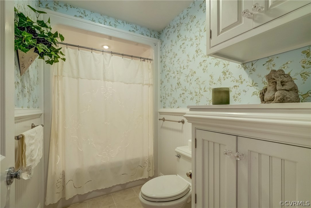 1571 Pine Hall Road Mathews, VA 23109 - Photo 35 of 48 a bathroom with a sink a toilet and shower