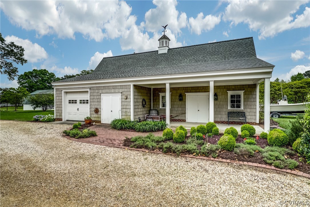 1571 Pine Hall Road Mathews, VA 23109 - Photo 43 of 48 a view of house with a yard and front view of a house