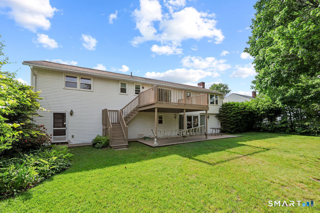 142 Wolcott Hill Road Wethersfield, CT 06109 - Photo 29 of 29 a view of a house with yard and sitting area