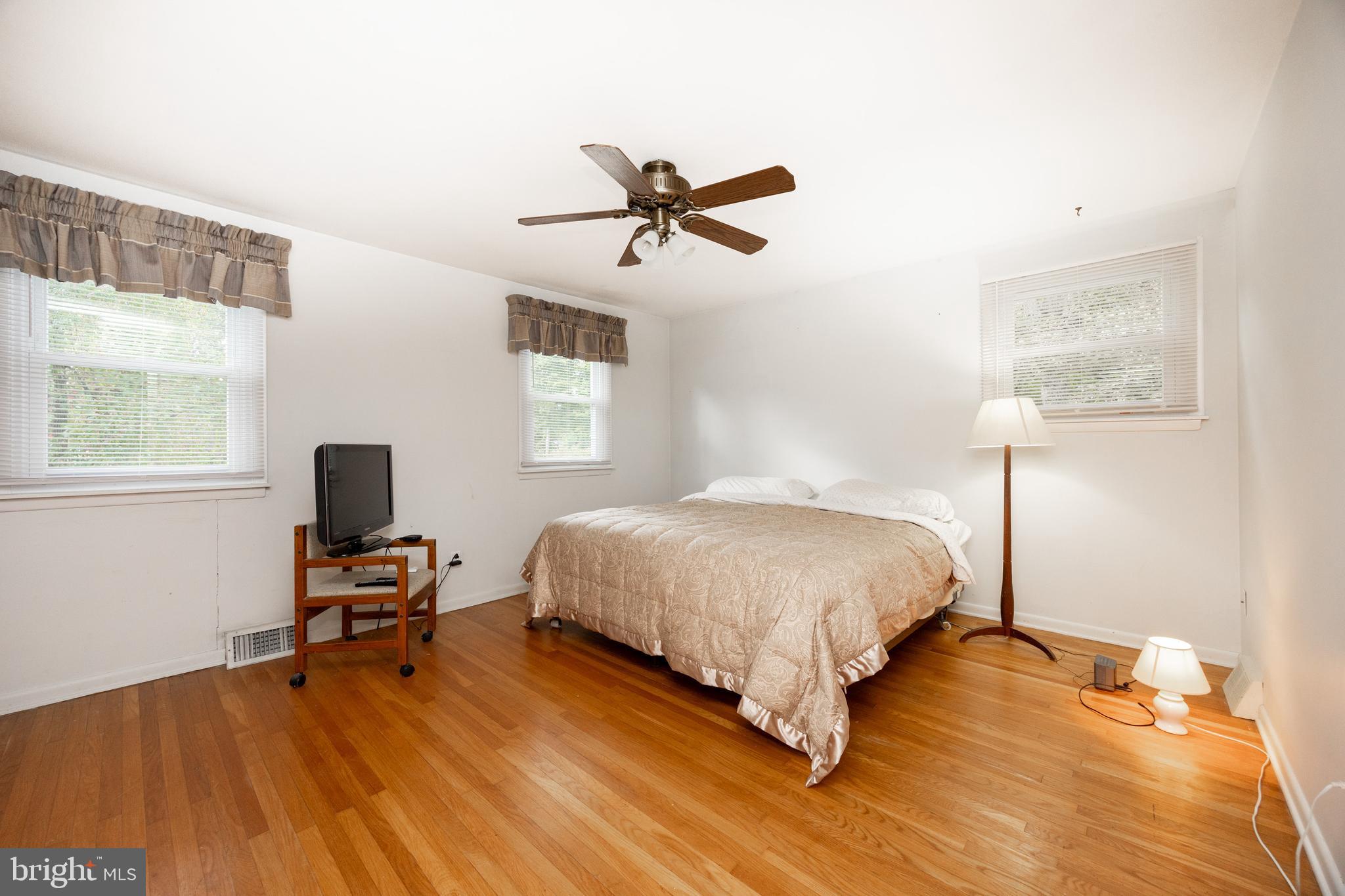 208 Morris Road Exton, PA 19341 - Photo 18 of 43 a bedroom with a bed and a window