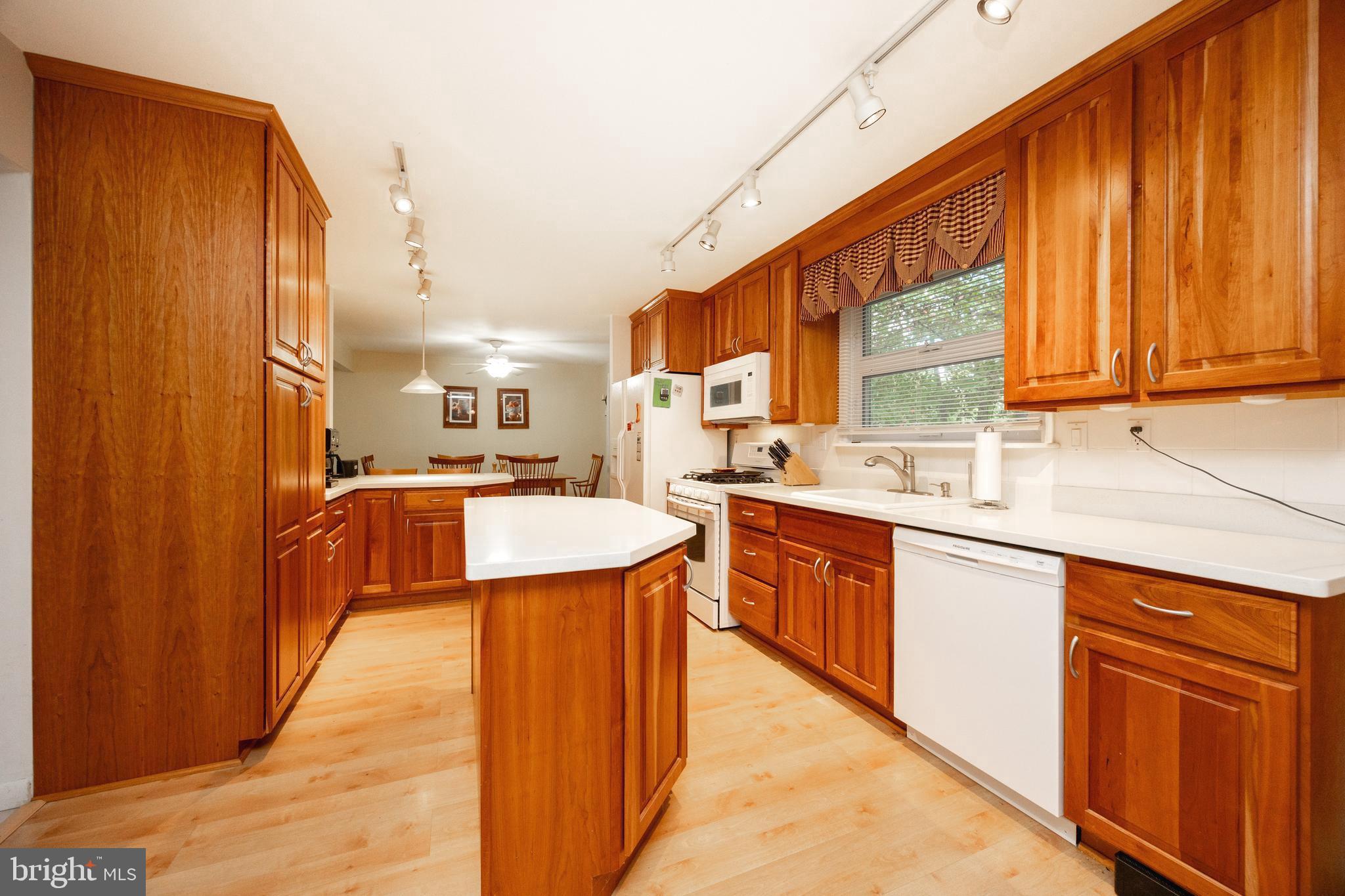 208 Morris Road Exton, PA 19341 - Photo 2 of 43 a large kitchen with stainless steel appliances granite countertop a sink and cabinets
