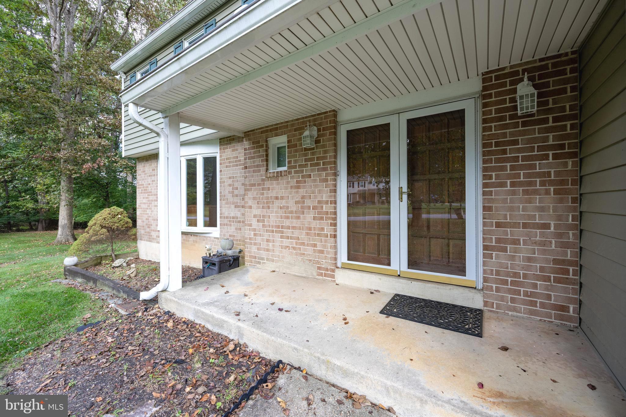 208 Morris Road Exton, PA 19341 - Photo 24 of 43 a front view of a house with a yard