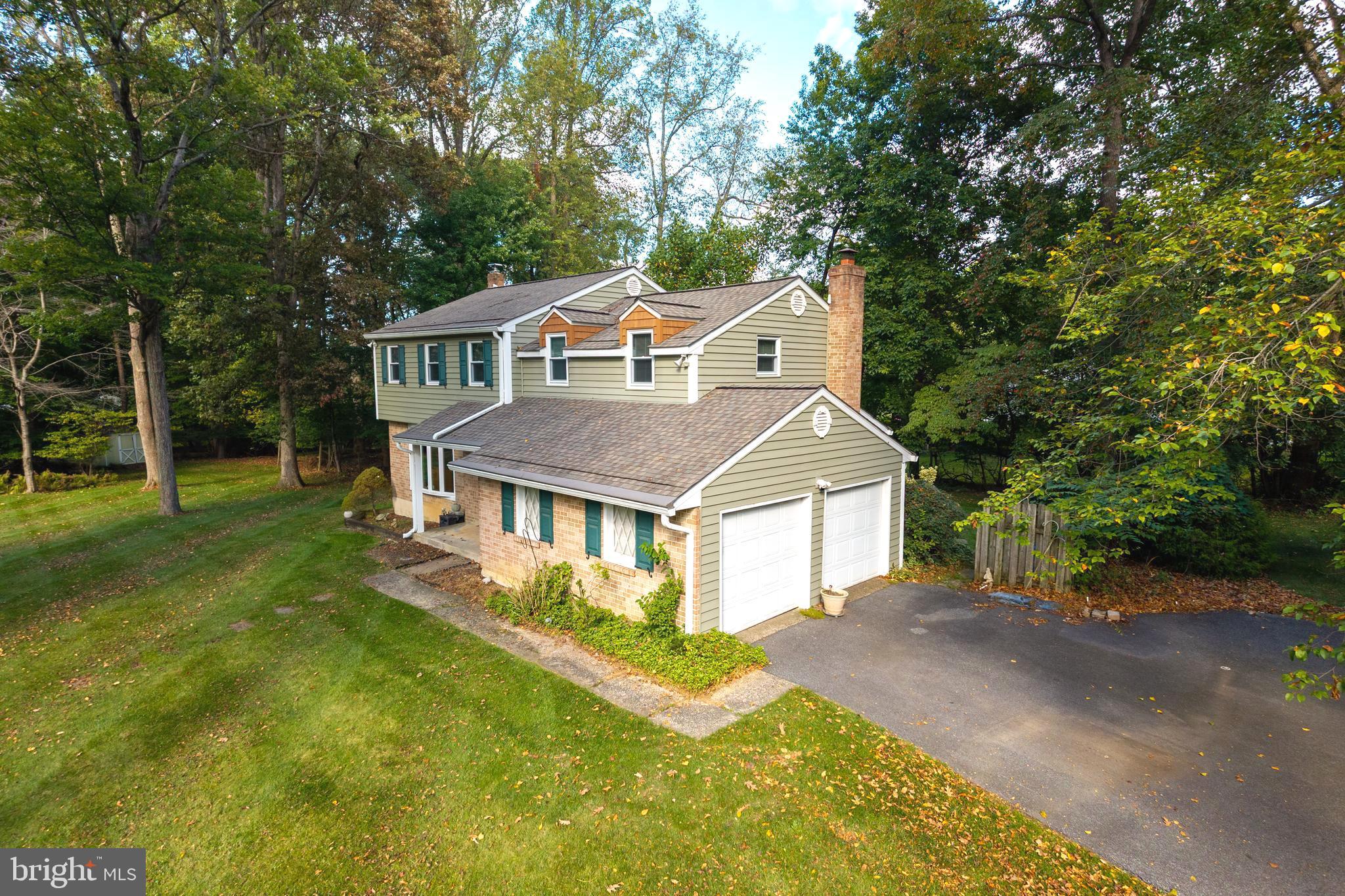 208 Morris Road Exton, PA 19341 - Photo 27 of 43 front view of a house with a yard