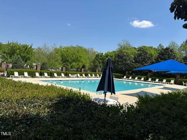a view of a playground with basketball court