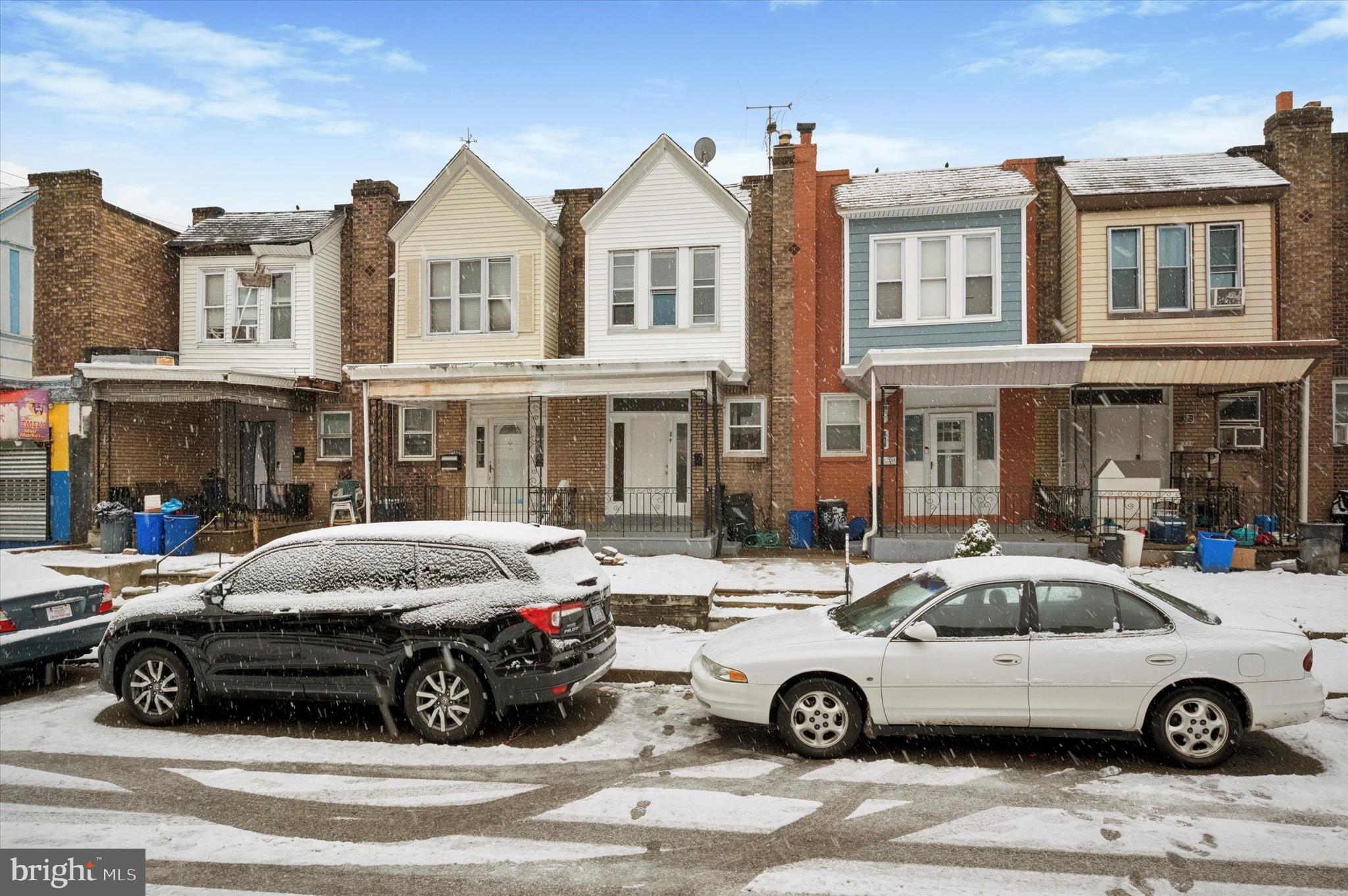 a cars parked in front of a house