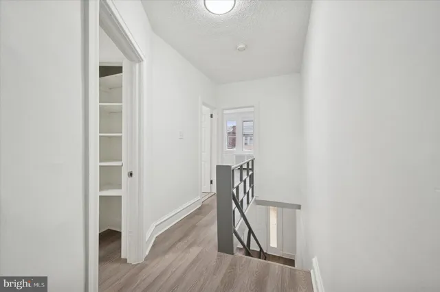 a view of entryway with wooden floor