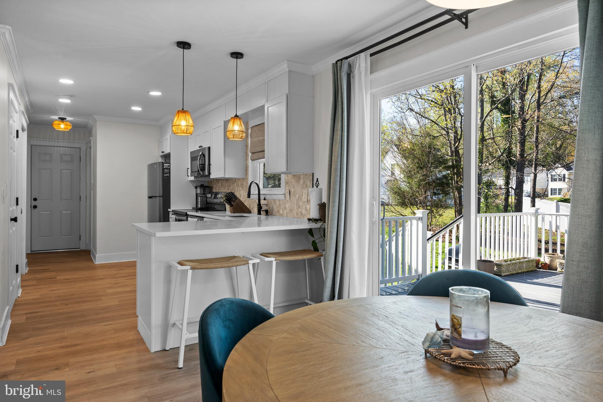3704 9th Street North Beach, MD 20714 - Photo 12 of 42 a room with fireplace furniture and a wooden floor