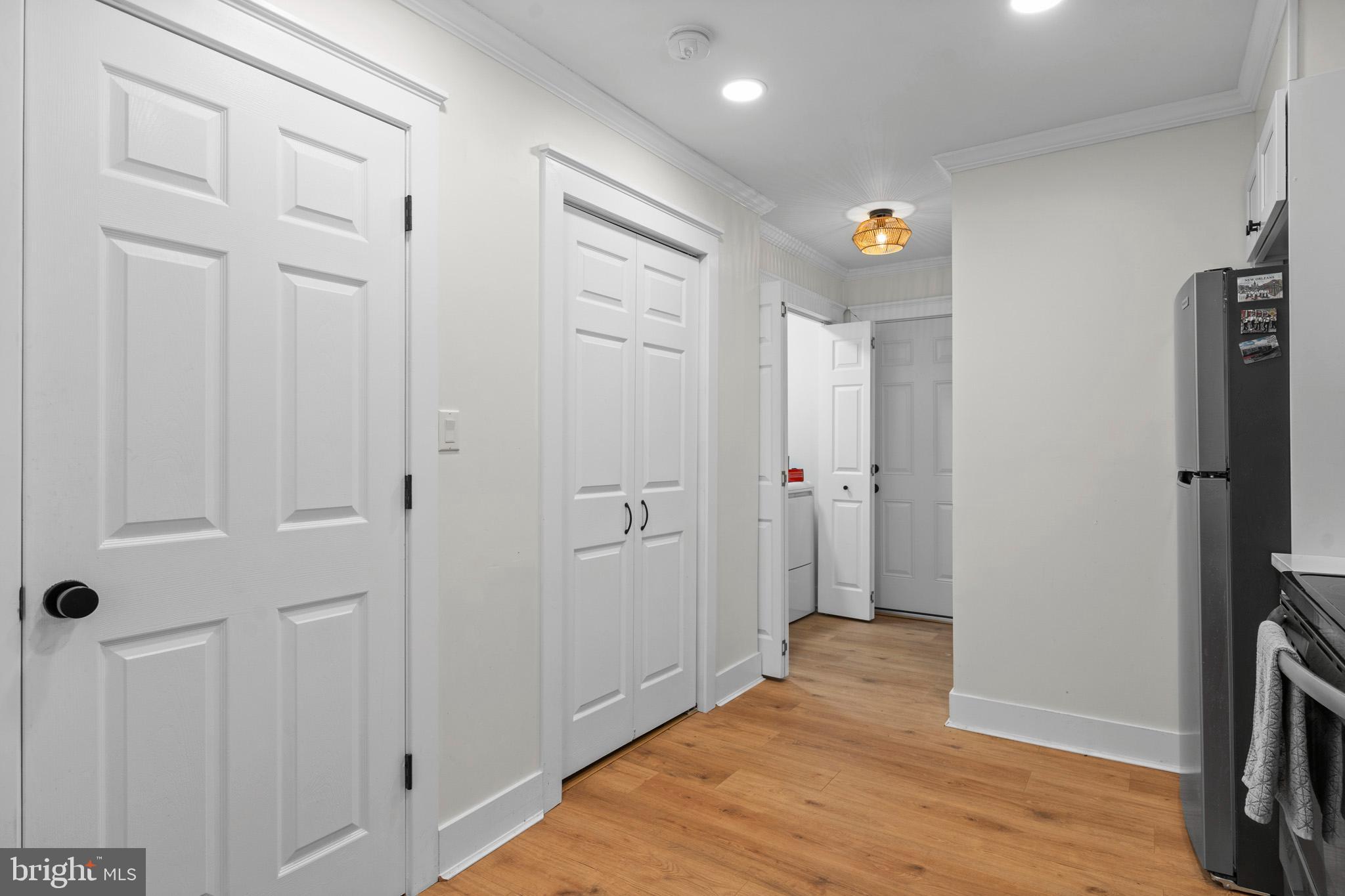 3704 9th Street North Beach, MD 20714 - Photo 13 of 42 a view of hallway with wooden floor