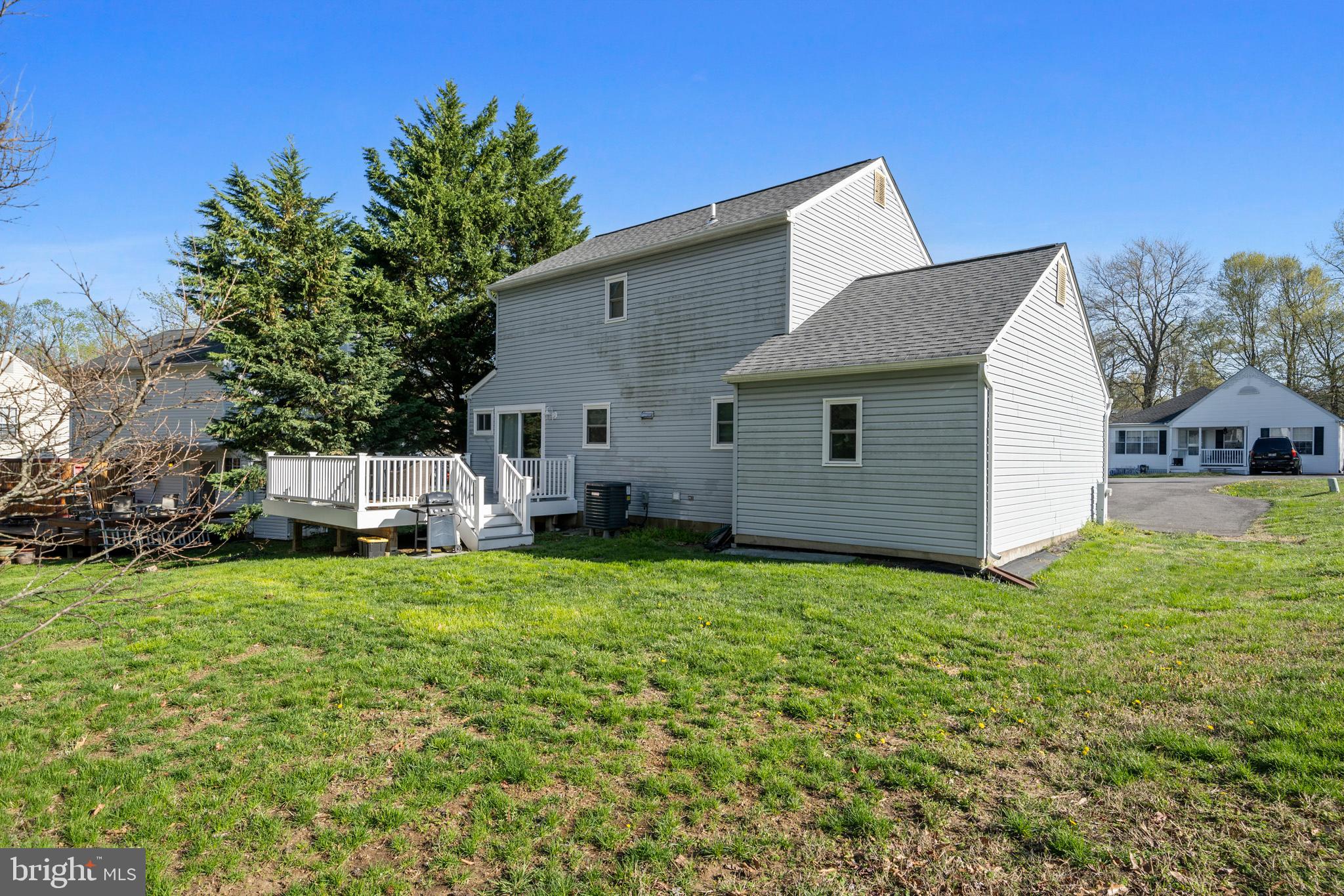 3704 9th Street North Beach, MD 20714 - Photo 25 of 42 a view of a house with backyard