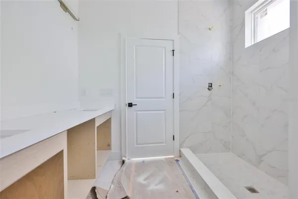 a bathroom with a bathtub