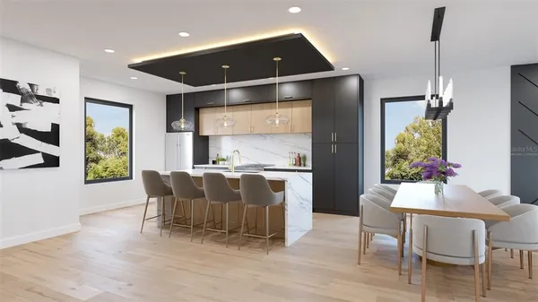 a view of kitchen and dining area with furniture