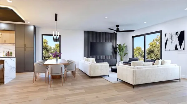 a living room with furniture and white walls