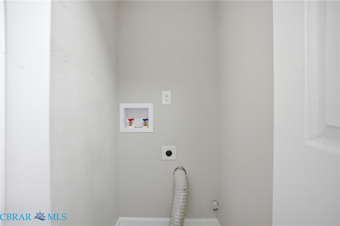 733 Spruce Street Hampton, VA 23661 - Photo 22 of 29 Laundry area featuring hookup for a washing machine and hookup for an electric dryer