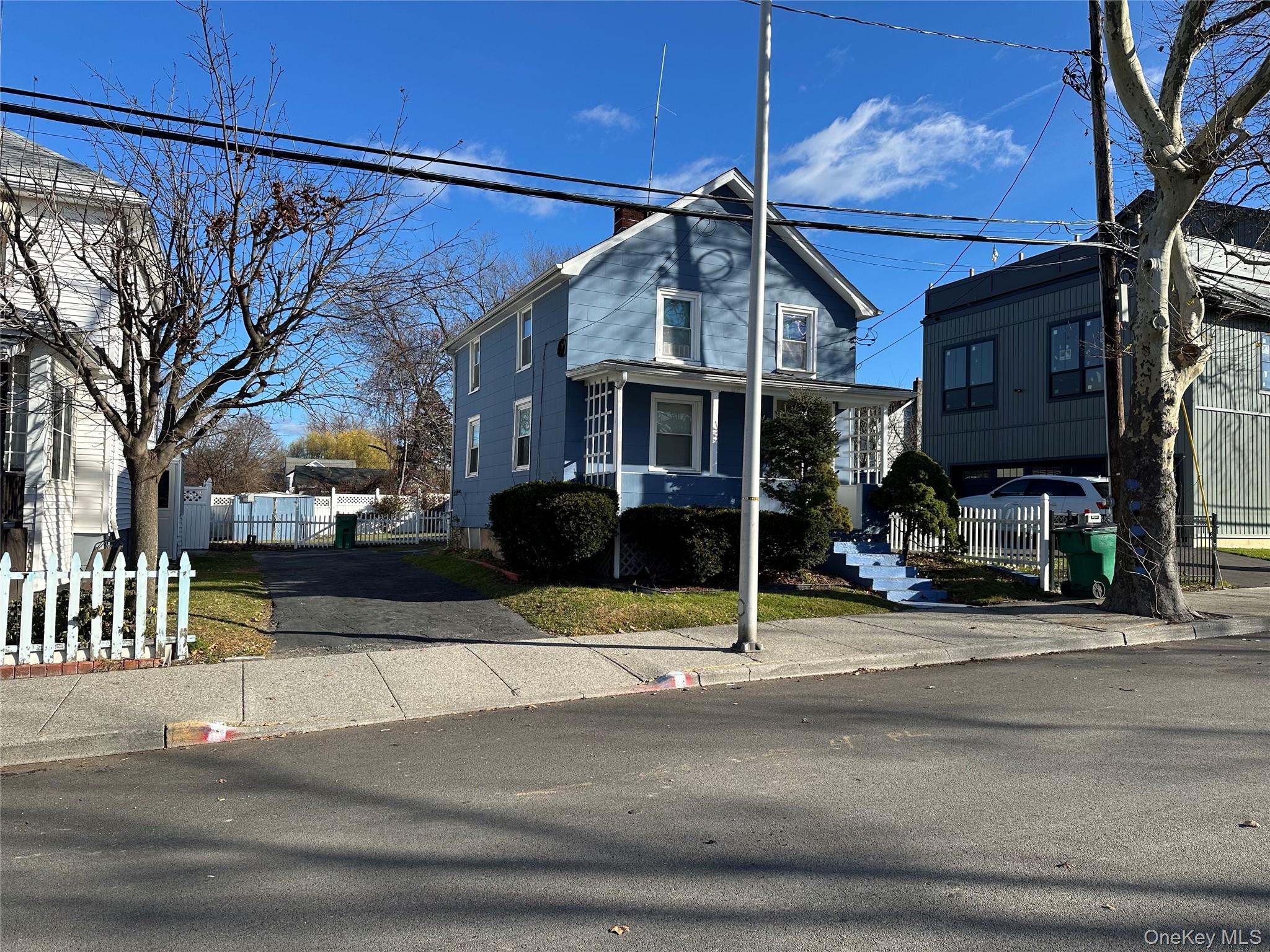76 Church Street Beacon, NY 12508 - Photo 23 of 26 Traditional-style home with a chimney