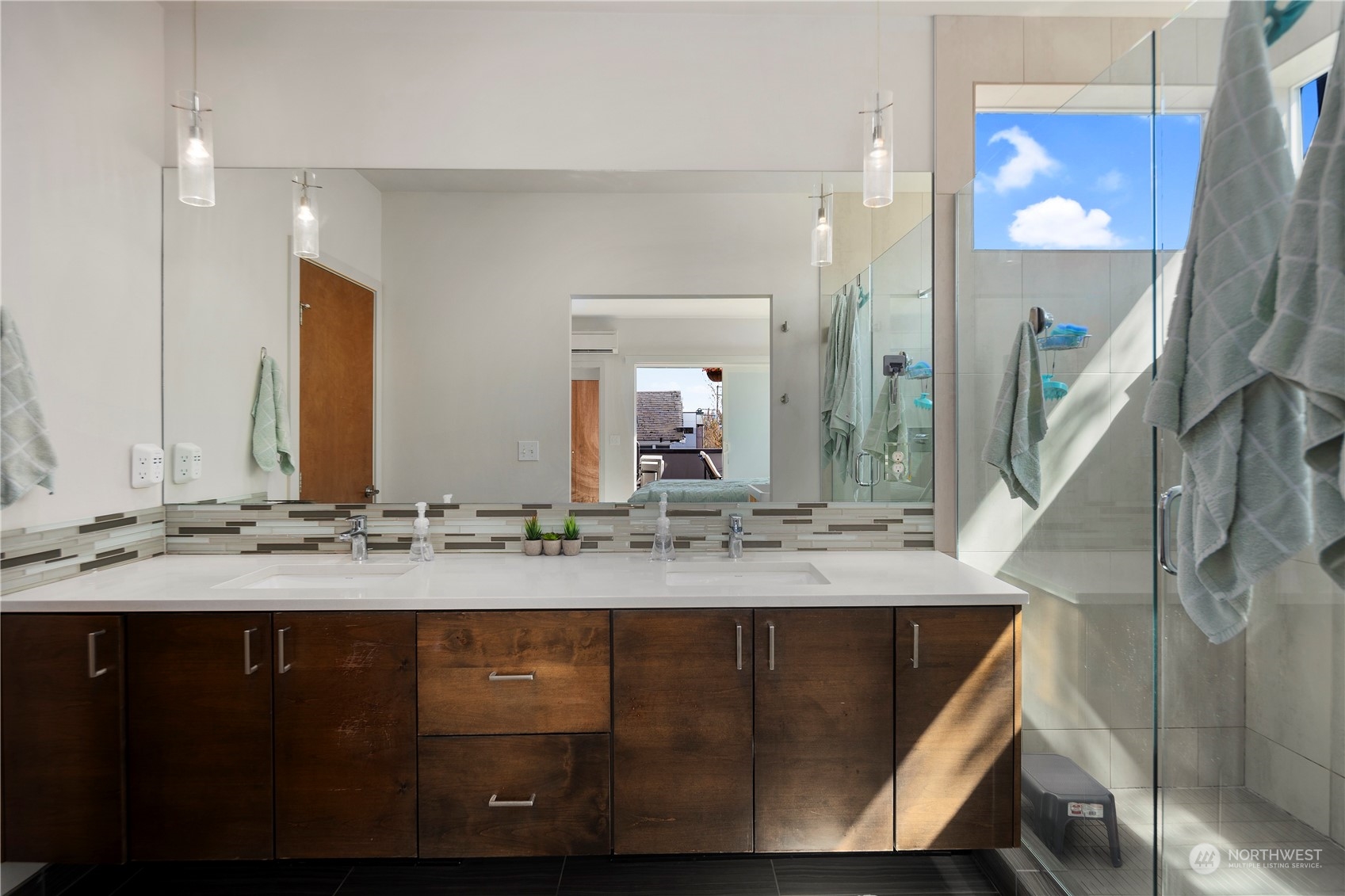 218 North 39th Street Seattle, WA 98103 - Photo 22 of 27 a bathroom with a sink and a mirror