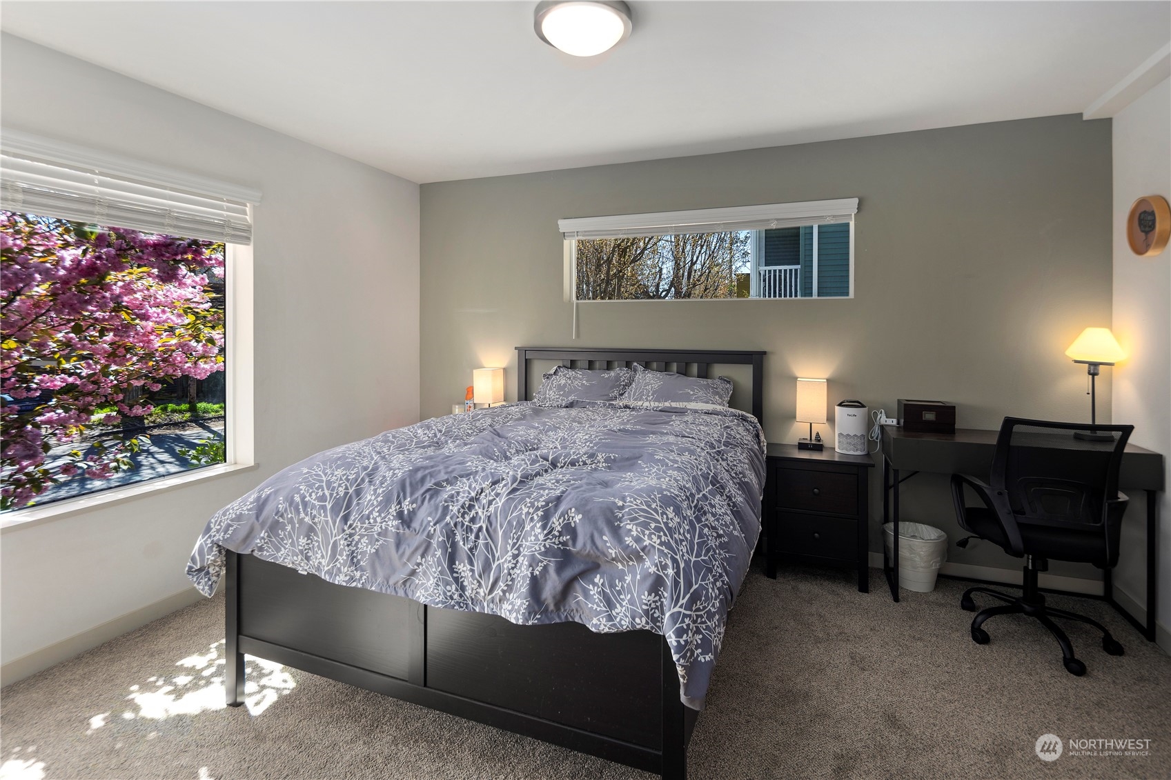 218 North 39th Street Seattle, WA 98103 - Photo 4 of 27 a bed sitting in a bedroom next to a window