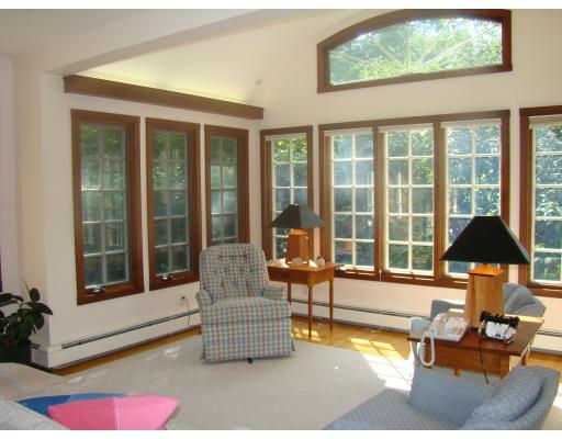 28 Byfield Road Newton, MA 02468 - Photo 2 of 8 a living room with patio furniture and a large window