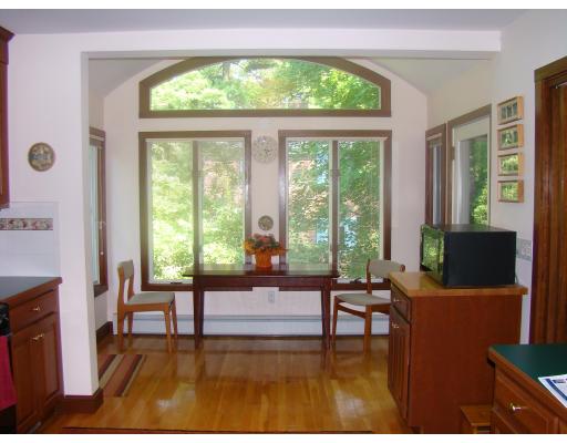 28 Byfield Road Newton, MA 02468 - Photo 5 of 8 a living room with furniture and a large window