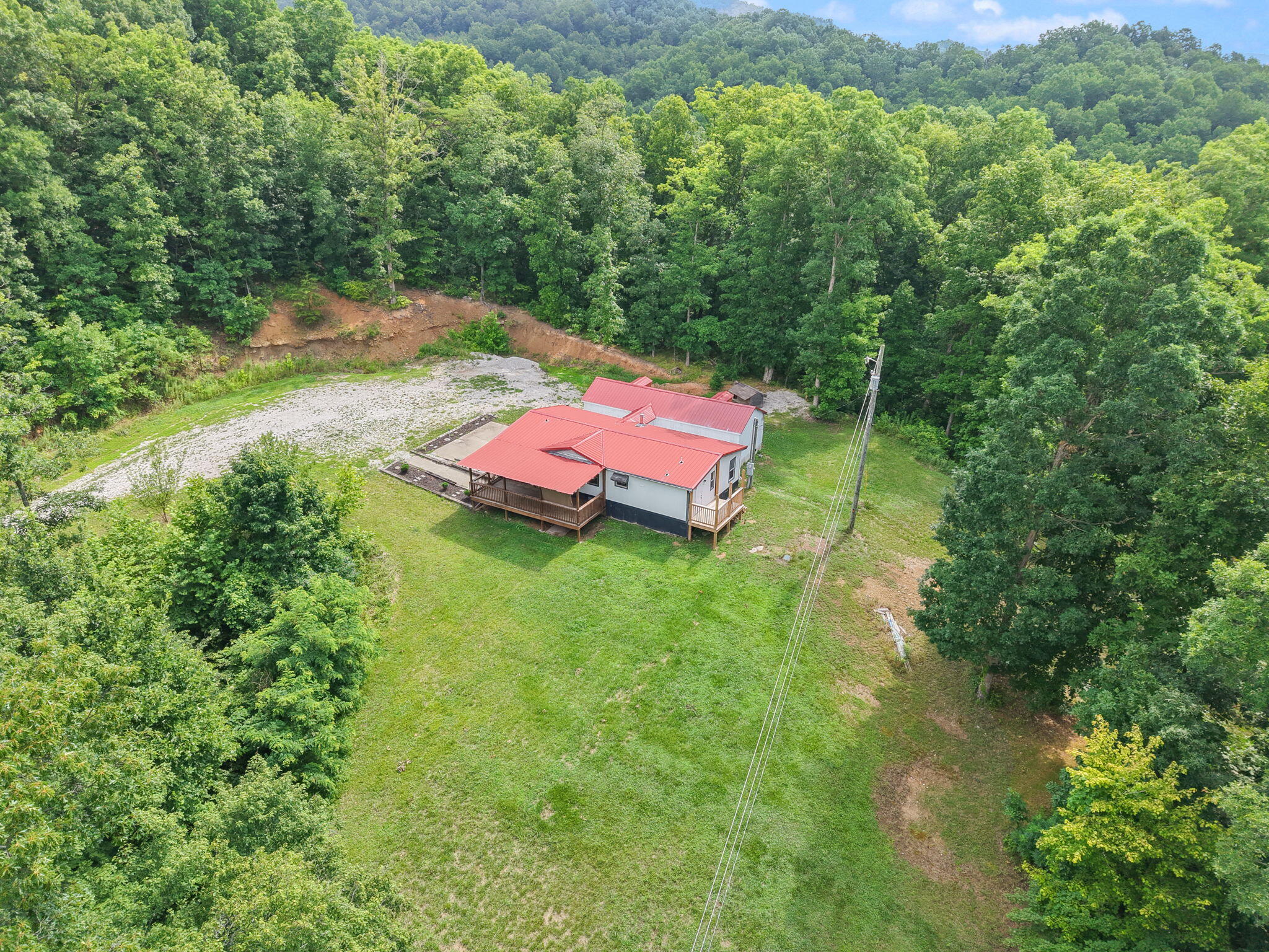414 Coldiron Hollow Morehead, KY 40351 - Photo 4 of 50 83-web-or-mls-DJI_20260629111354_0588_D