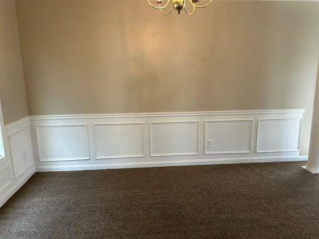 a view of room and front door