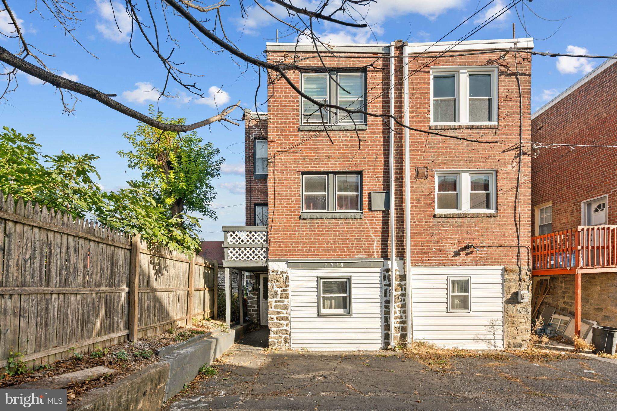 7818 Lennox Road Upper Darby, PA 19082 - Photo 28 of 28 a view of a house with a street