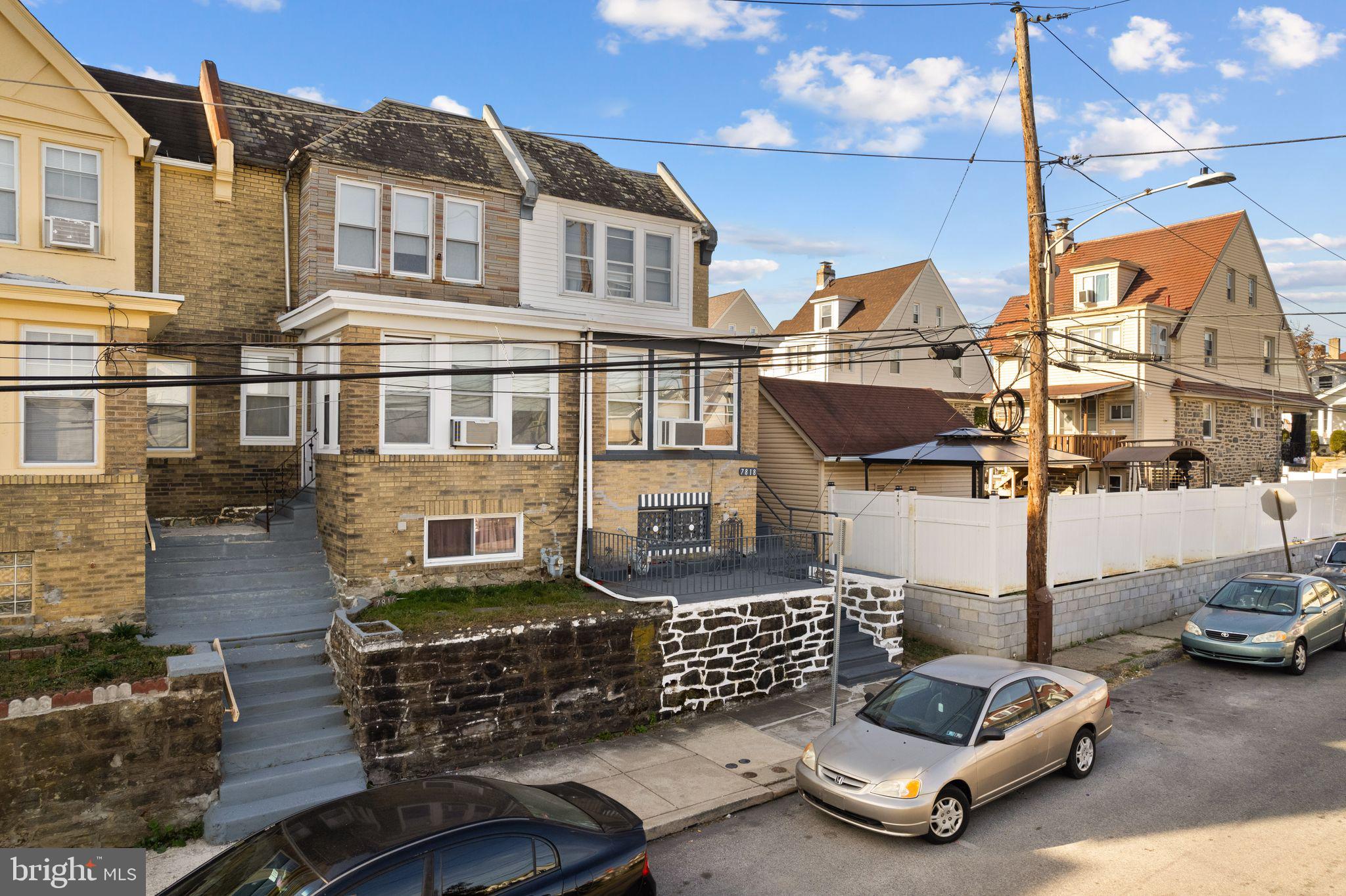 7818 Lennox Road Upper Darby, PA 19082 - Photo 3 of 28 a car parked in front of a building