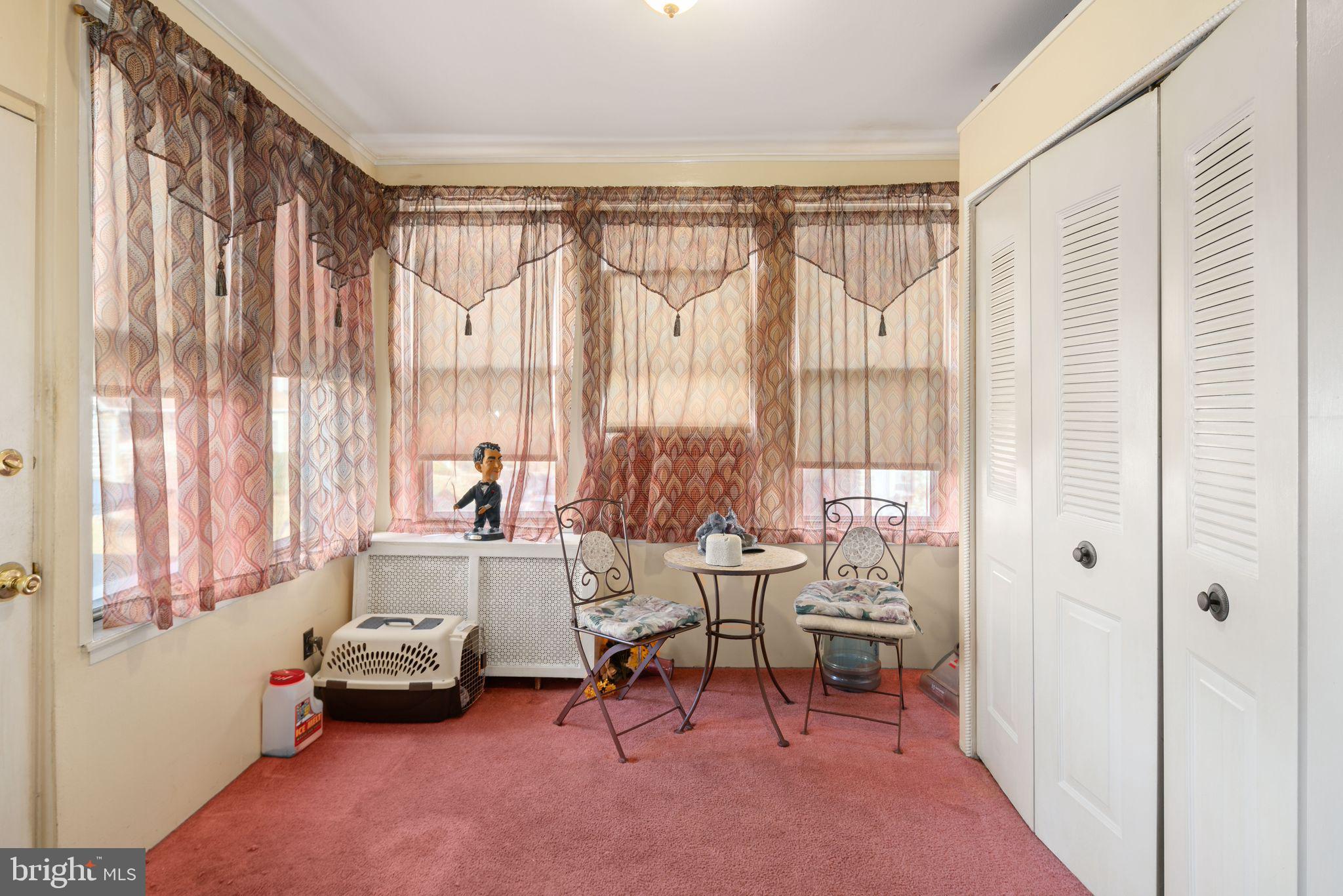 7818 Lennox Road Upper Darby, PA 19082 - Photo 5 of 28 a living room with furniture and a large window