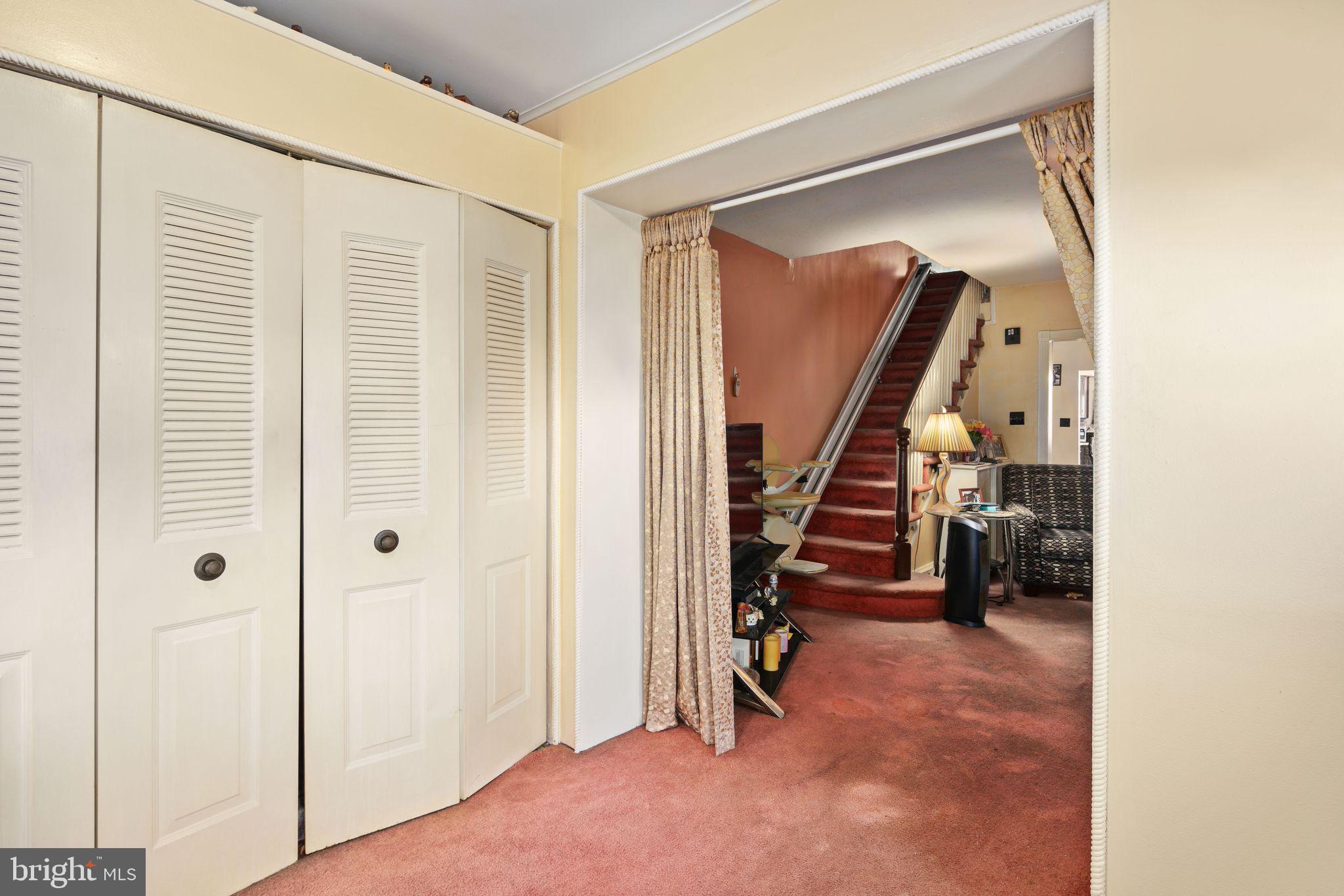 7818 Lennox Road Upper Darby, PA 19082 - Photo 6 of 28 a view of a livingroom with stairs