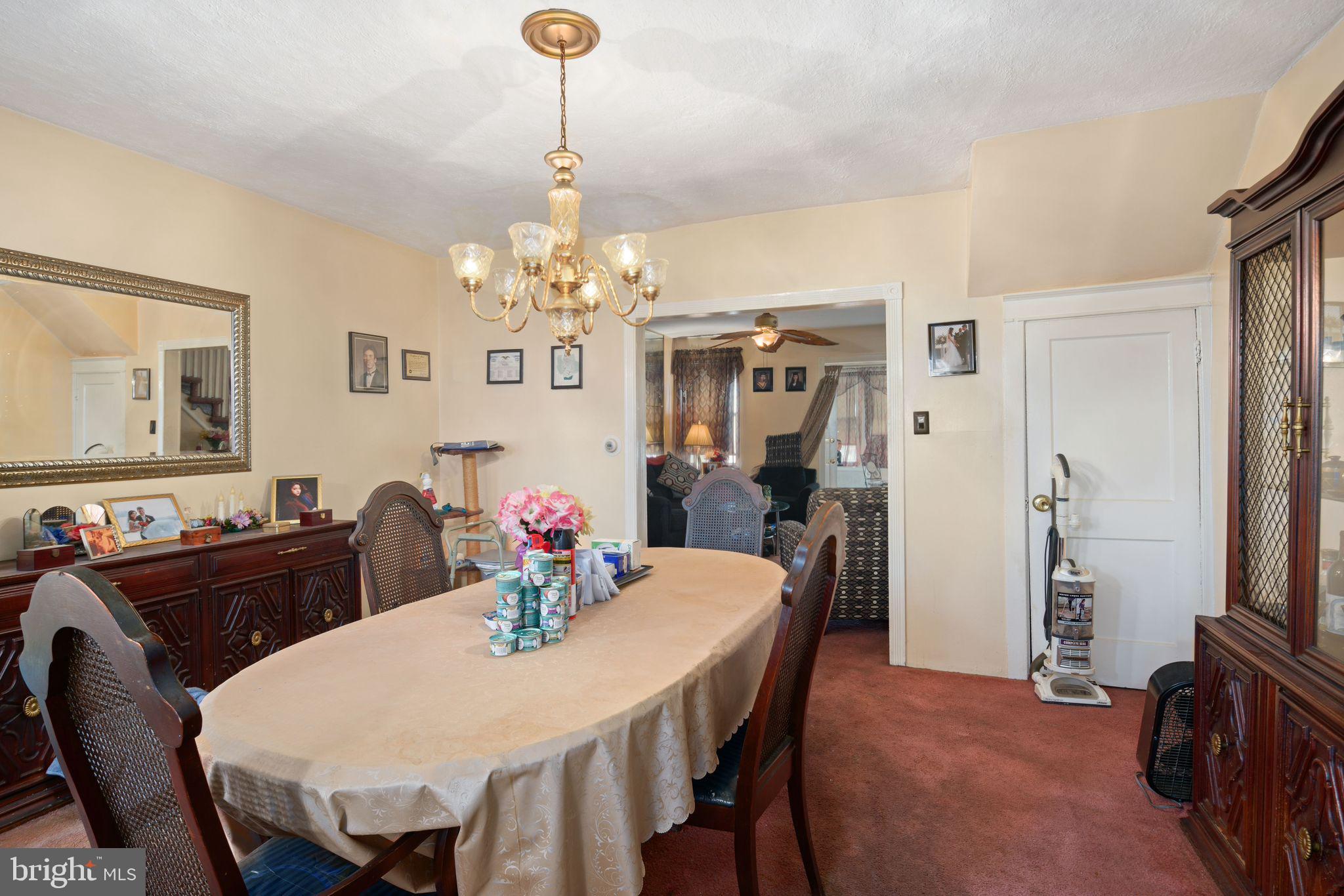 7818 Lennox Road Upper Darby, PA 19082 - Photo 9 of 28 a view of a dining room with furniture and chandelier