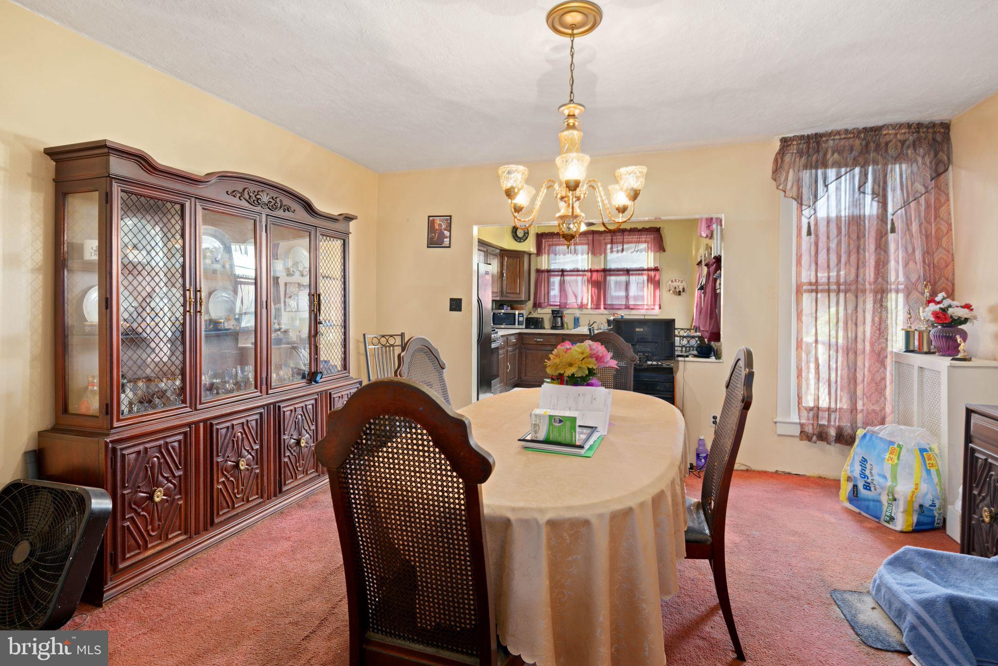 7818 Lennox Road Upper Darby, PA 19082 - Photo 10 of 28 a view of a dining room with furniture window and outside view