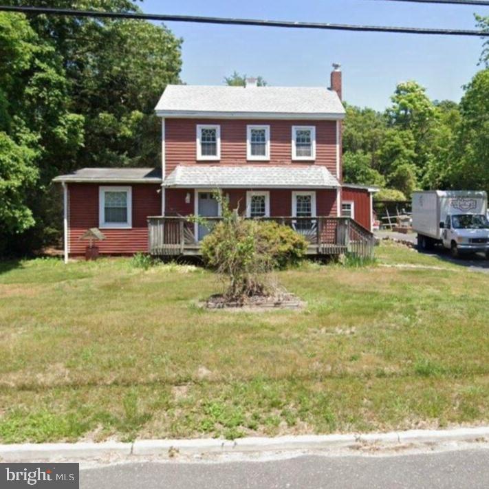 935 Winslow Road Williamstown, NJ 08094 - Photo 1 of 1 a front view of a house with garden