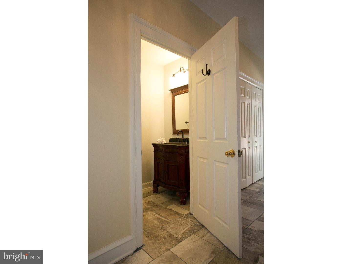 115 Roumfort Road, Unit 3 Philadelphia, PA 19119 - Photo 4 of 22 Half Bath