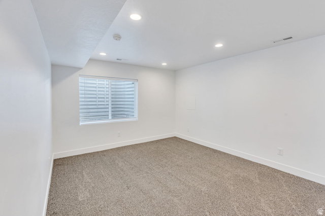252 North Sunrise Rnch Drive Mapleton, UT 84664 - Photo 45 of 62 Carpeted room featuring a single window with blinds, recessed lighting, and white baseboards