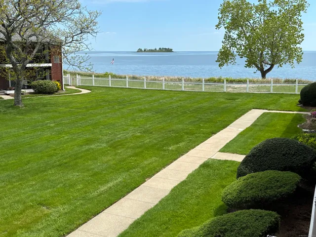 a view of a golf course with a garden