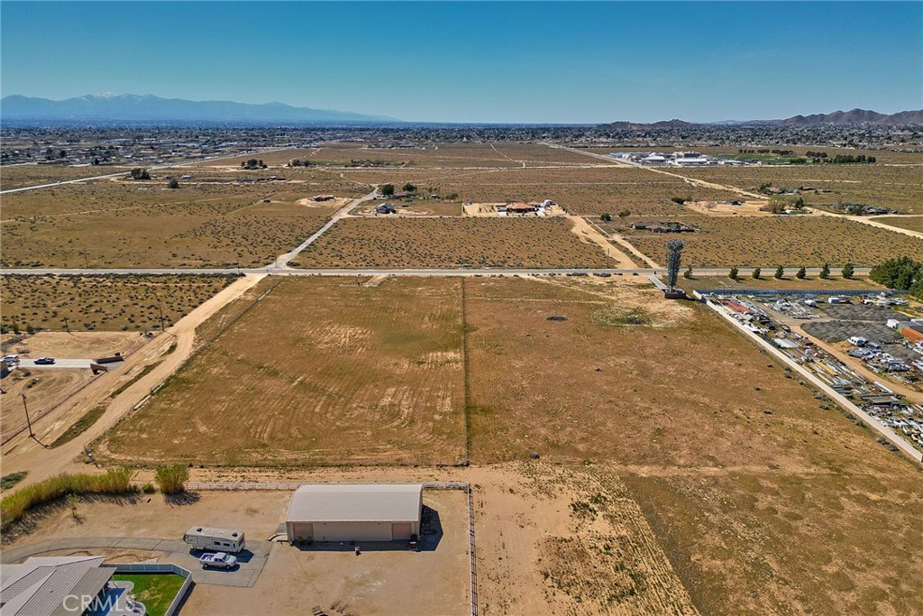 13915 Joshua Road Apple Valley, CA 92307 - Photo 3 of 5 an aerial view of residential houses with outdoor space