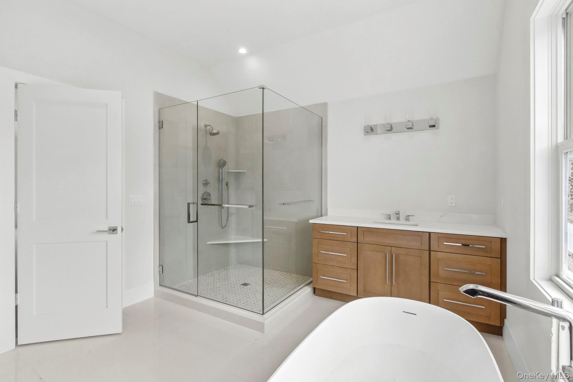 34 Old Main Road Quogue, NY 11959 - Photo 16 of 27 Primary Suite Bathroom