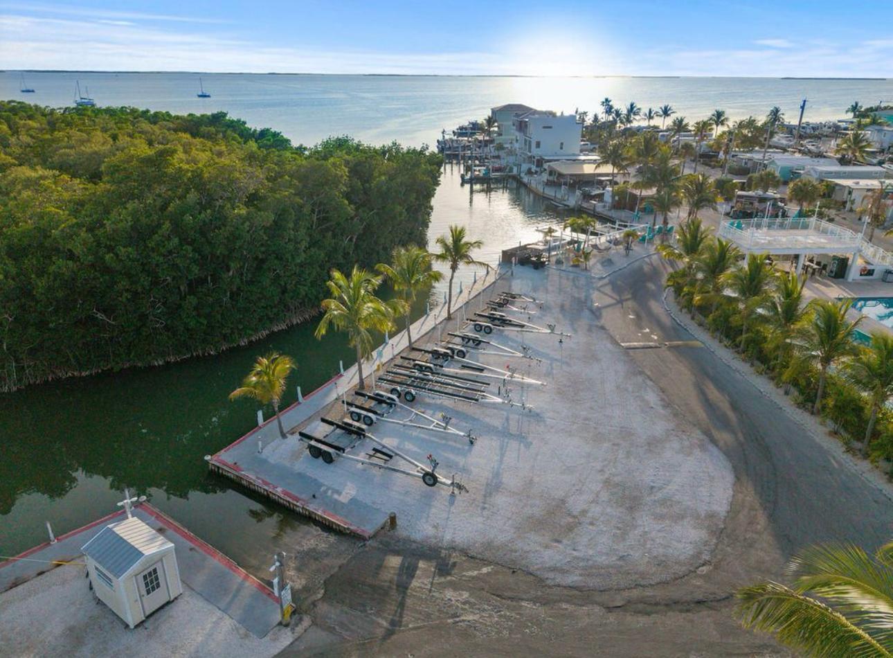 325 Calusa Street, Unit 454 Key Largo, FL 33037 - Photo 18 of 23 a view of a lake with outside space