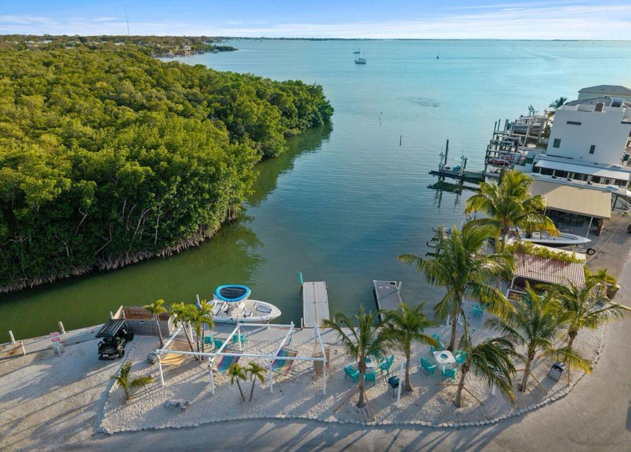 325 Calusa Street, Unit 454 Key Largo, FL 33037 - Photo 7 of 23 a view of a lake with a mountain in the background