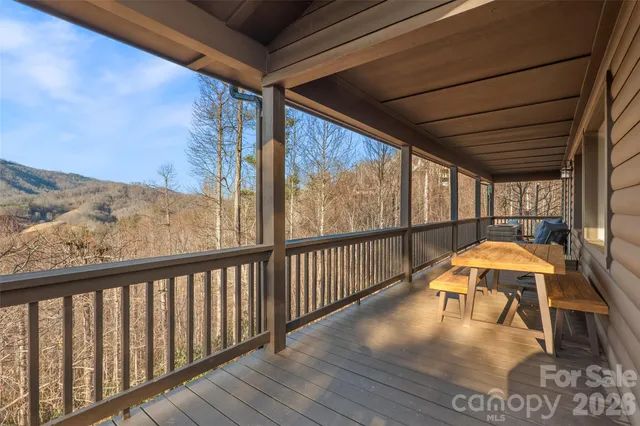 a view of balcony with furniture