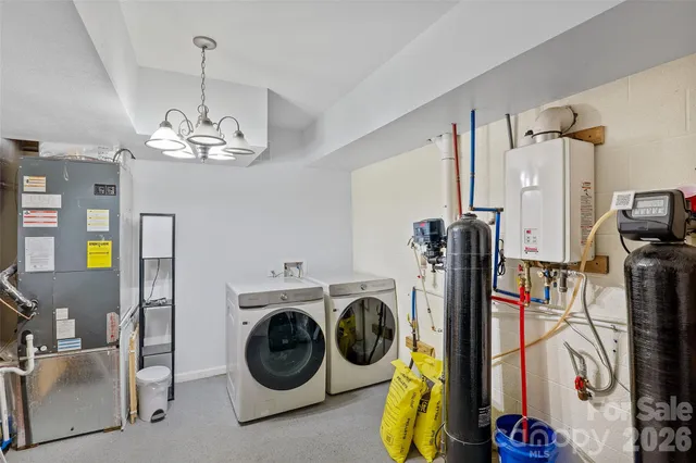 a view of a storage & utility room with washer and dryer