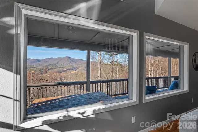 a view of a balcony with a potted plant