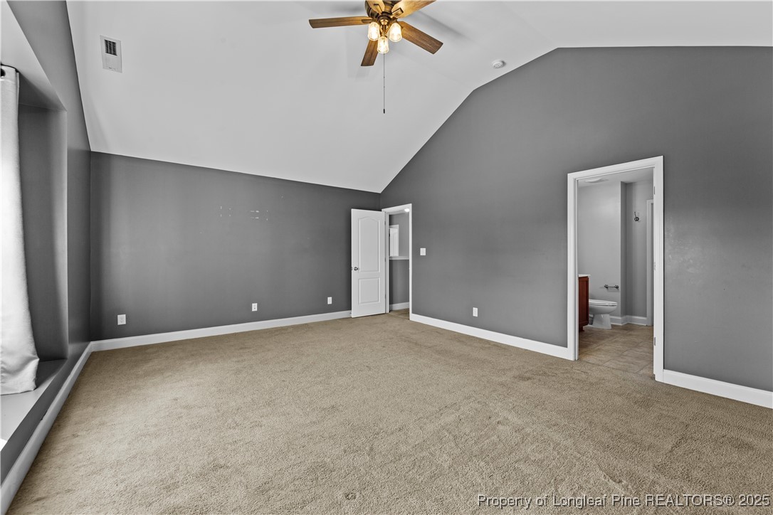 178 Tun Tavern Drive Cameron, NC 28326 - Photo 16 of 30 an empty room with fan and ceiling fan