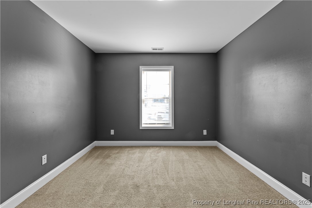 178 Tun Tavern Drive Cameron, NC 28326 - Photo 22 of 30 an empty room with a window